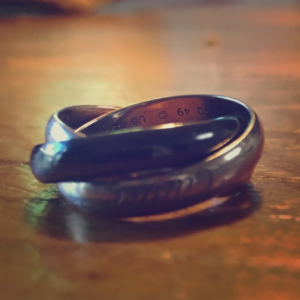 Cartier white gold and ceramic trinity ring.